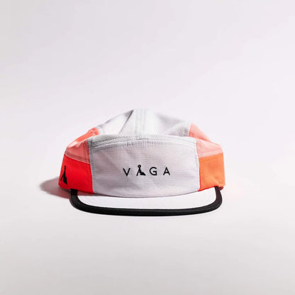 Colorful cap with 'VAGA' logo on a light gray background