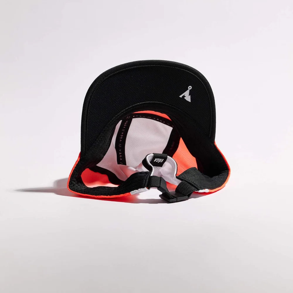 Black and red bucket hat on a light gray background