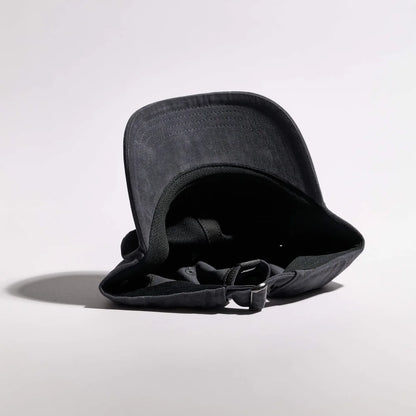 Black baby seat cover on a white background