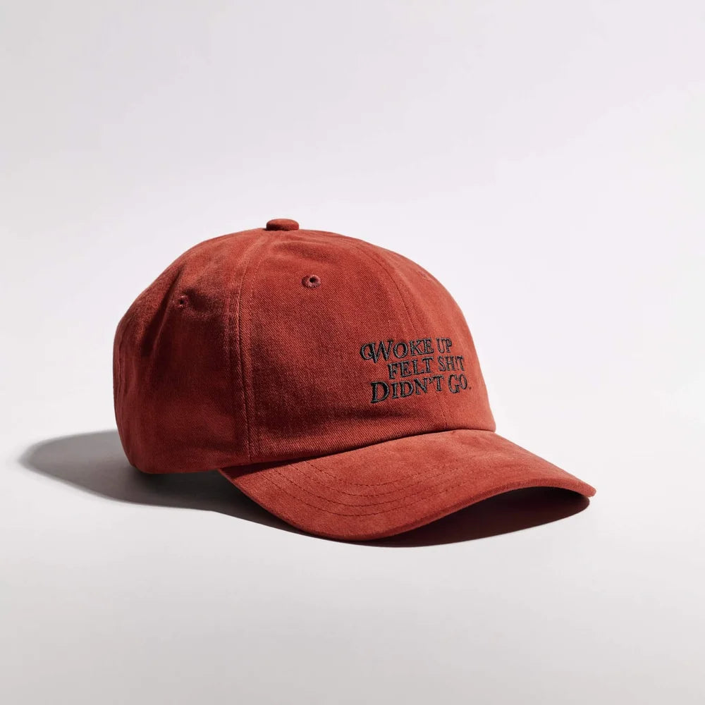 Red cap with text on a white background