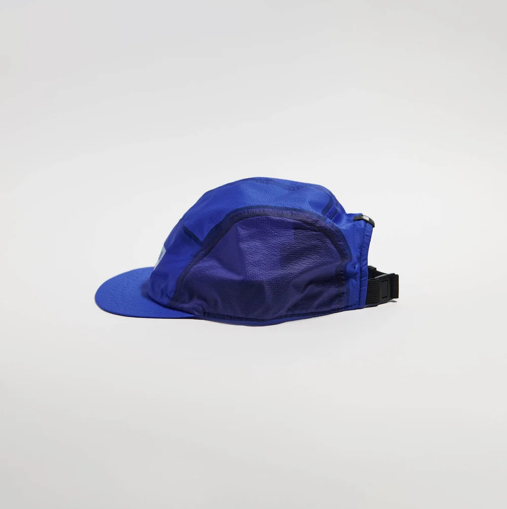 Blue cap with a strap on a white background