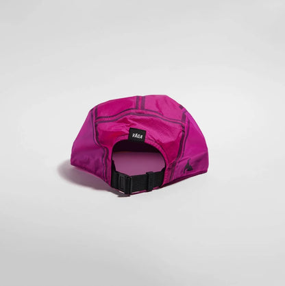 A bright magenta pink athletic cap with a black adjustable strap and a small black brand tag reading 'Vixt', shown on a light gray studio background.