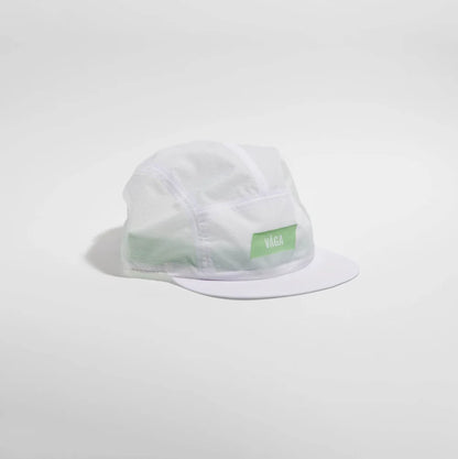 Clear plastic cap with a green label on a light gray background