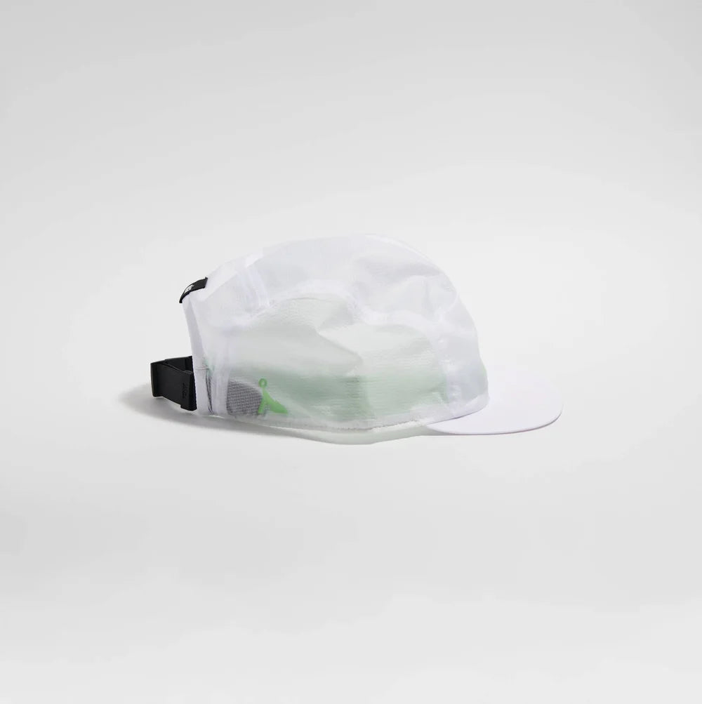 A white mesh running cap with a curved brim, featuring a black adjustable strap and a small green logo on the side, set against a seamless light gray studio background.