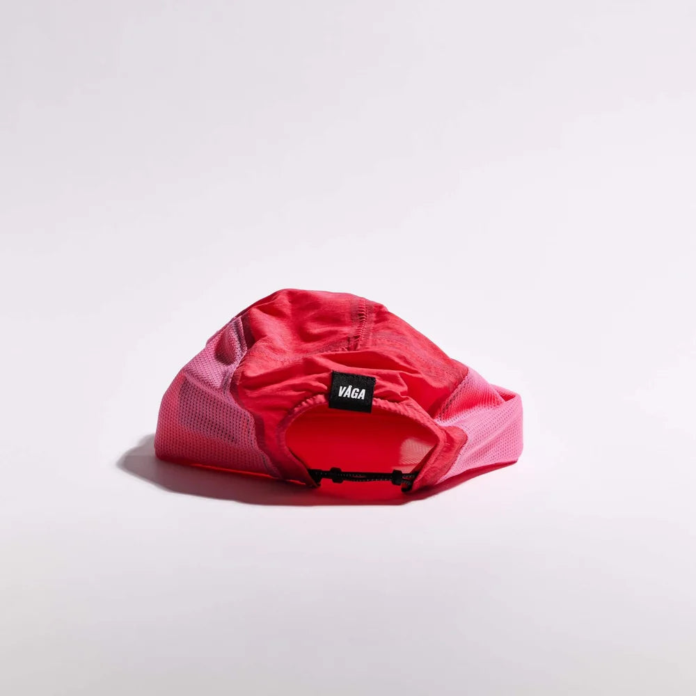Red bag with 'VAGA' logo on a light gray background