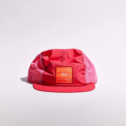 Red cap with a visible brand logo on a light gray background