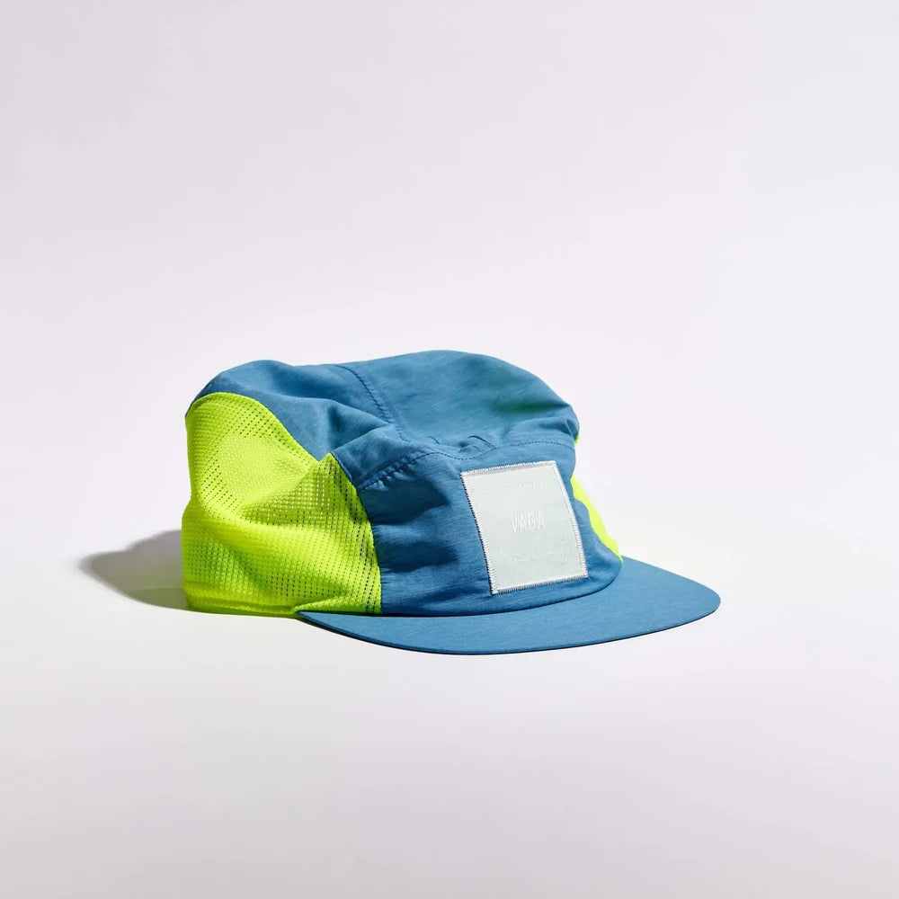 Blue and green cap on a white background