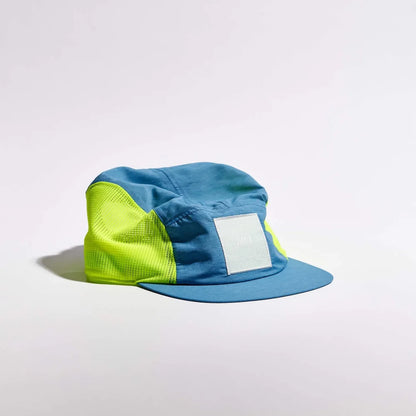 Blue and green cap on a white background