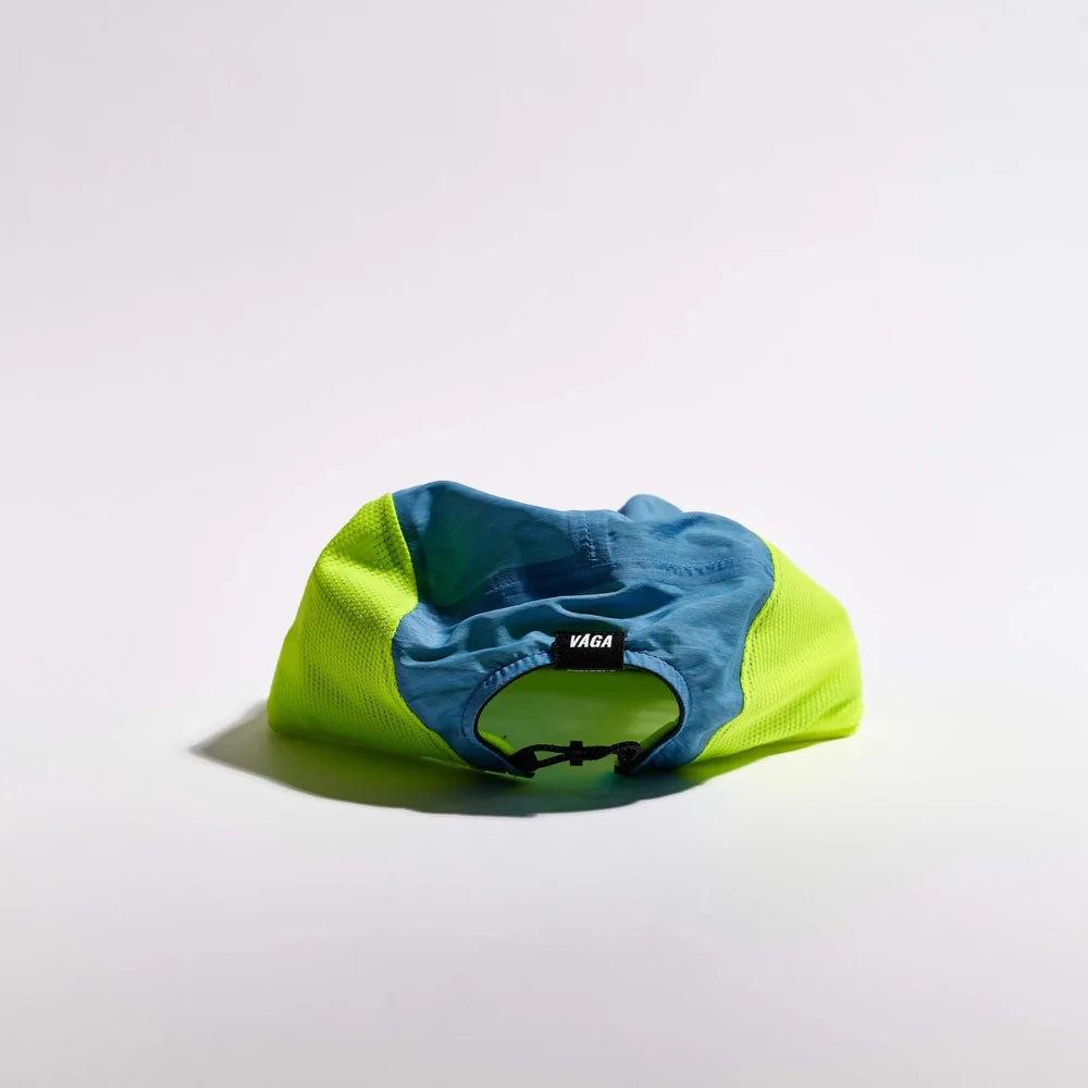 Green and blue bean bag chair with 'VAGA' branding on a white background