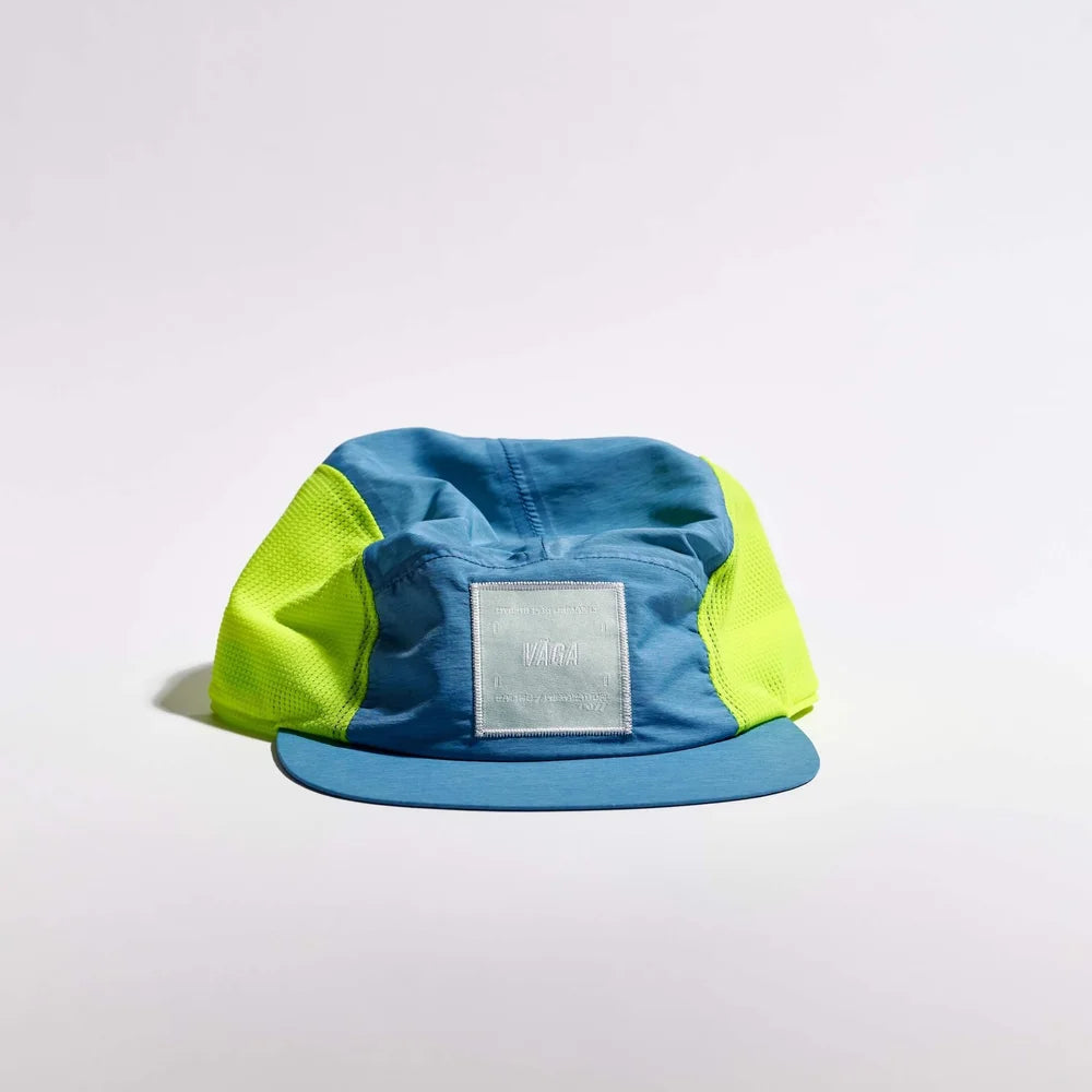 Blue and green cap with a visible brand logo on a white background